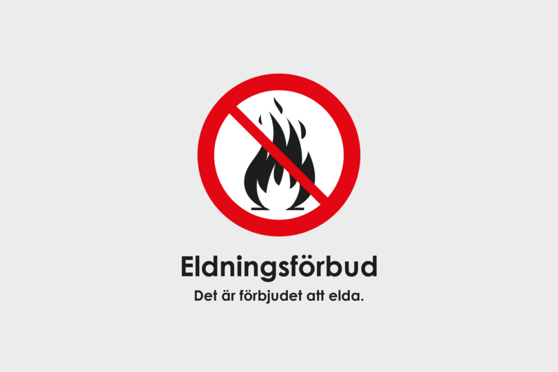 Text: Eldningsförbud. Det är förbjudet att elda.