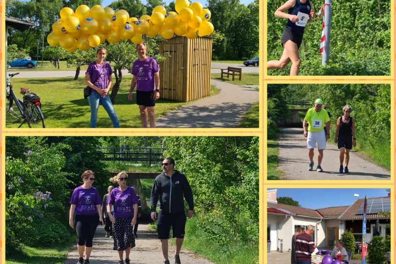 Personer i lila t-shirts går och springer på gångvägar.